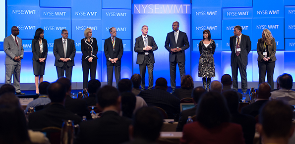 Greg Foran (sixth from left) and Walmart executives field analysts' questions.